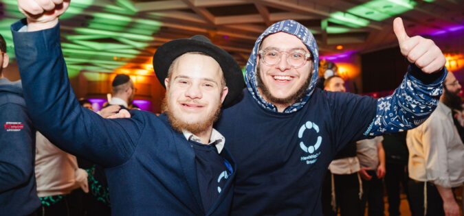 Friendship Circle Lights Up Chanukah at Energetic Bash